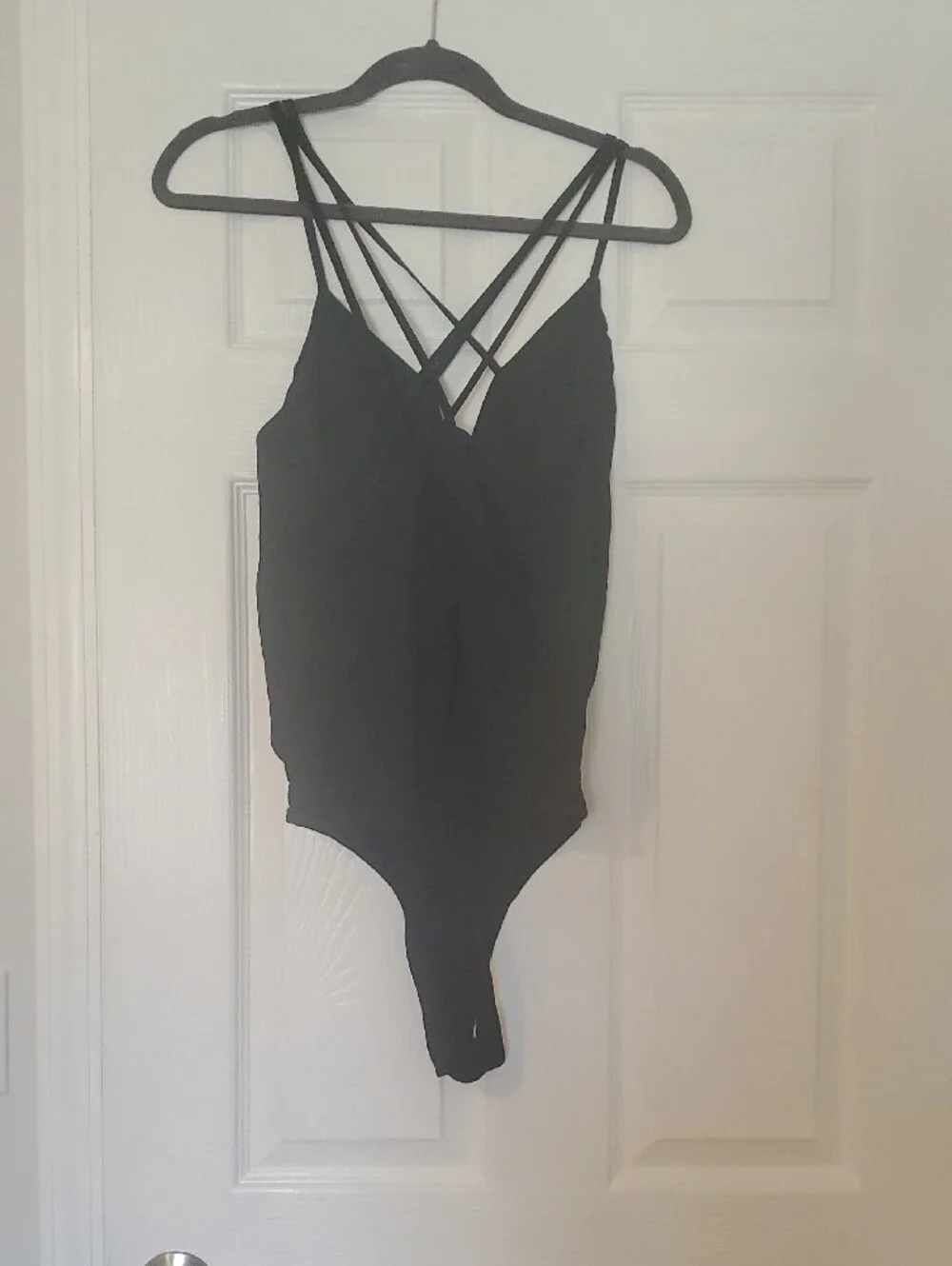 Black Strappy Cross-Back One-Piece Bodysuit